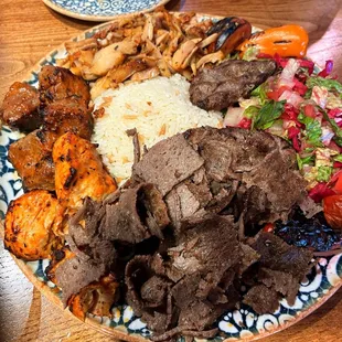 Warning: objects in photo are larger than they appear! Very generous portions, mixed grill for two