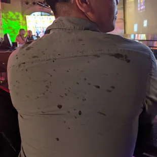 Shirt is full of oil from the owner throwing  out chicken wings back at the buyer ecause he thought he had the right to to be disrespectful.