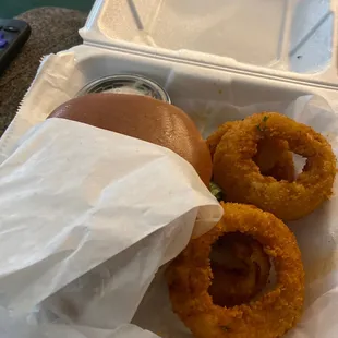 Onion rings close slaw fish sandwich