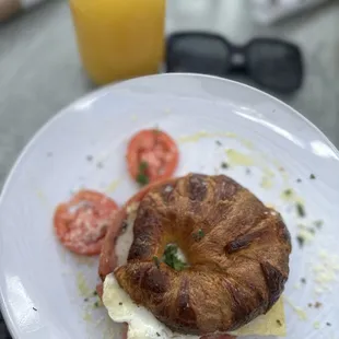 a croissant sandwich on a plate