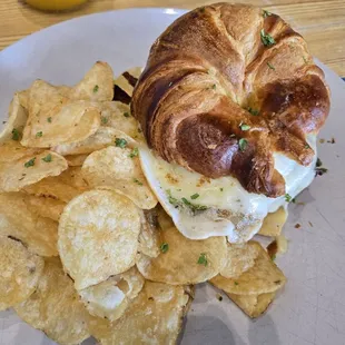 Croissant in Miami w/ Bacon and side of potato chips