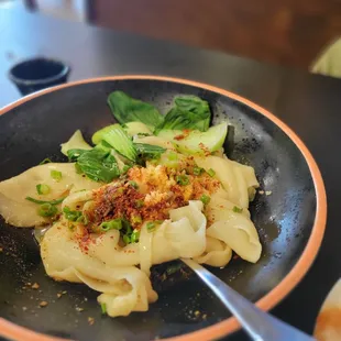 Biang Biang Noodles -- Minced garlic, green onions, chili, sprinkled with hot oil. Traditional flat chewy noodles and flavorful. Delicious!!