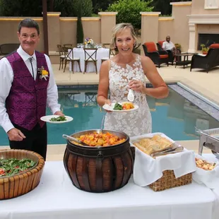 George at Sandy at their wedding, excited to enjoy Chef Daniel's amazing meal!!