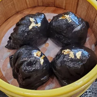 Squid Ink Shrimp Dumpling with Gold Leaf