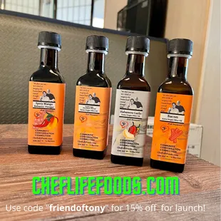 three bottles of sauce