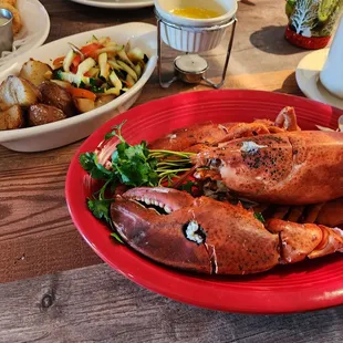 Lobster with sides (roasted potatoes and vegetables)