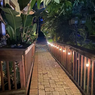 a walkway at night