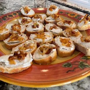 Goat cheese and caramelized onion crostini - SO good!!
