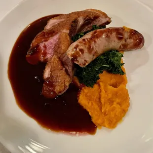 Duck Breast, foie gras based sausage, sweet potato mash and lightly sautéed kale. Plate was empty soon after this photo.