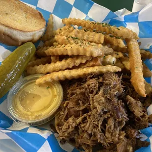 Pulled pork sandwich, fries, honey mustard and pickle