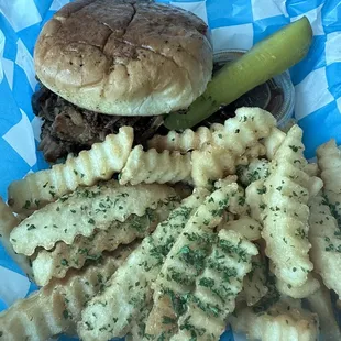 Pulled Pork Sandwich with fries.