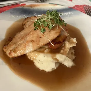 Chicken over mashed potatoes
