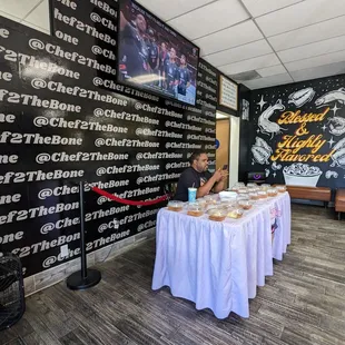 a woman sitting at a table