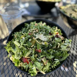 a bowl of salad on a table