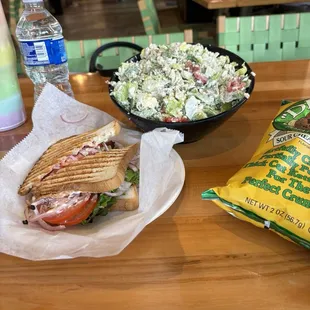 Cobb salad and BLT on gluten free bread with purple onion
