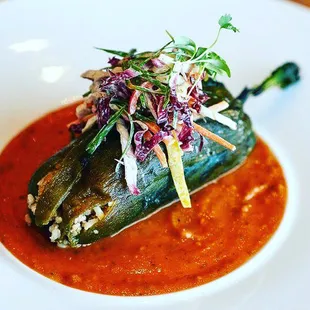 a plate of a stuffed poblao