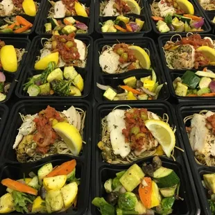 trays of food prepared for a meal