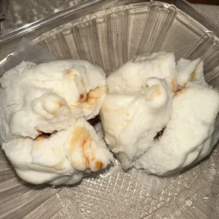 two pieces of bread in a plastic container