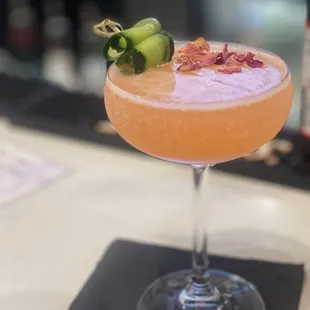 a cocktail in a coupe glass