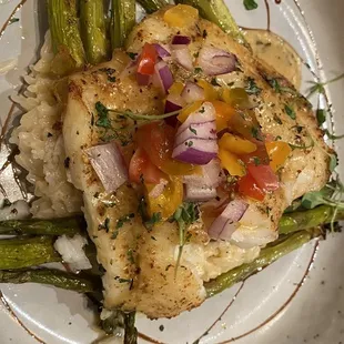 Pan seared sea bass with Parmesan rice &amp; wilted over cooked asparagus