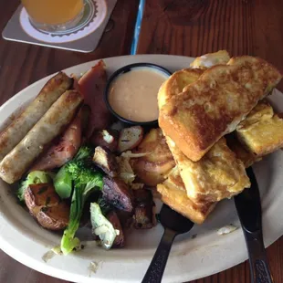 Grand marnier French toast, sausage, ham and potatoes! Amazing!