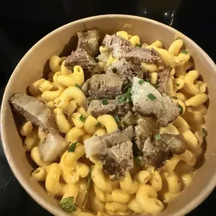 Mac and cheese, cheddar cheese sauce with brisket