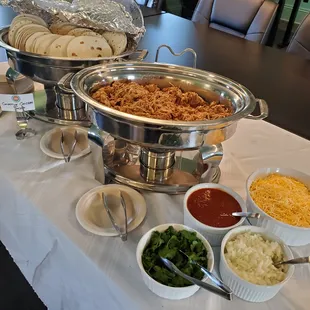Tiny Turkey Taco Station, with flour tortillas, salsa, onions, shredded cheese, and cilantro