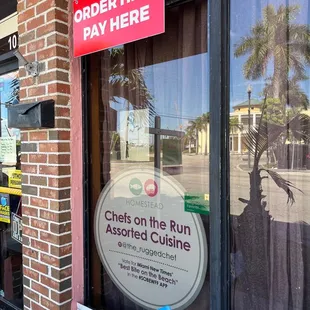 a blue chair in front of a restaurant