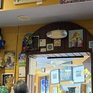 Artwork adorns the dining room.