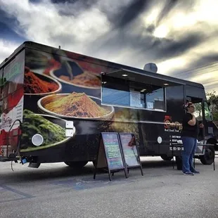 a food truck parked in a parking lot