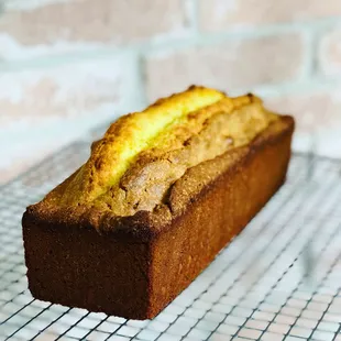 a loaf of bread on a cooling rack