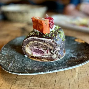 Slice of exquisite chocolate strawberry cream cake