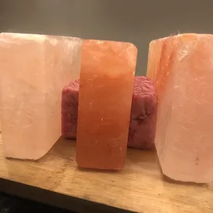 Seasoning between Himalayan salt blocks