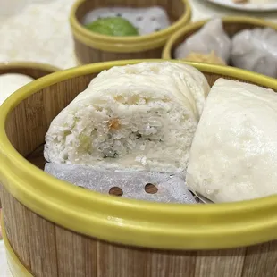 steamed sticky rice roll with mantou outer. slightly sweet