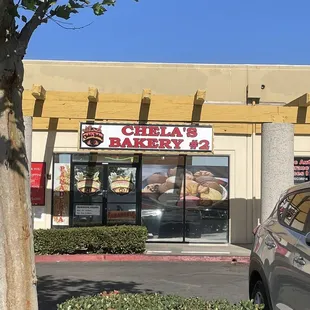  a car parked in front of the store