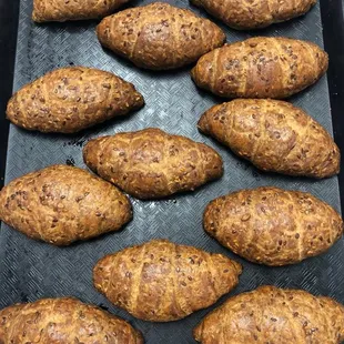 a tray of baked potatoes