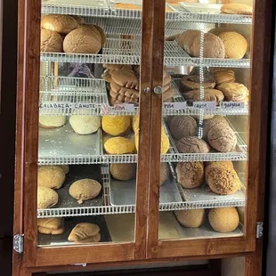 a display case full of baked goods
