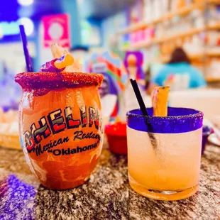 two cocktails on a table