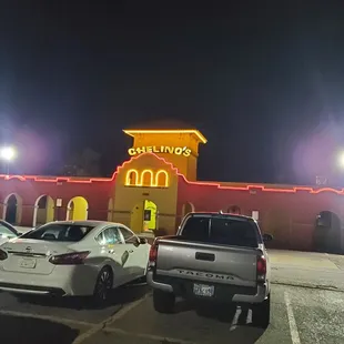 two cars parked in a parking lot