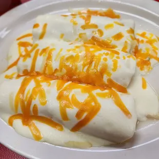 Chicken enchilada with sour cream sauce from top