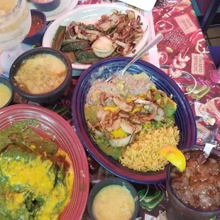 Onions, jalapenos, &amp; tomatoes, cheese dip, salsa, extra hot salsa, chile relleno, cheese enchiladas, rice, beans, tea, &amp; ice cold Mich Ultra