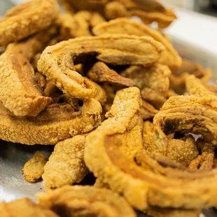 a pile of fried tortillas