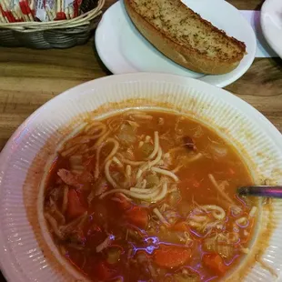 House made chicken soup served with buttered garlic bread