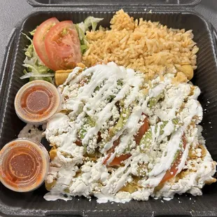 Yummy flautas with all the goodness toppings.