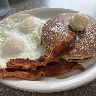 My delicious bacon and egg combo with very crispy bacon and two pancakes. It's on the senior special list for $11.50.