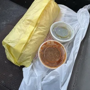Breakfast burrito with salsa.