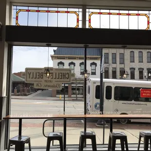 a view of a street through a window