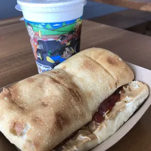 kids meal - Little D&apos;s PB &amp; J  $4.59 Creamy Peanut Butter, Strawberry Jam on Toasted Soft Bread. Choice of milk or a pop.