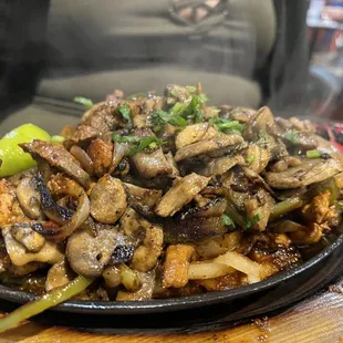 Chicken and steak fajitas with added mushroom