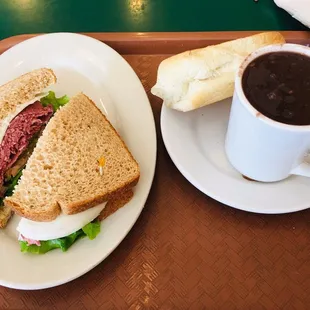 corned beef sandwich and cup of black bean soup